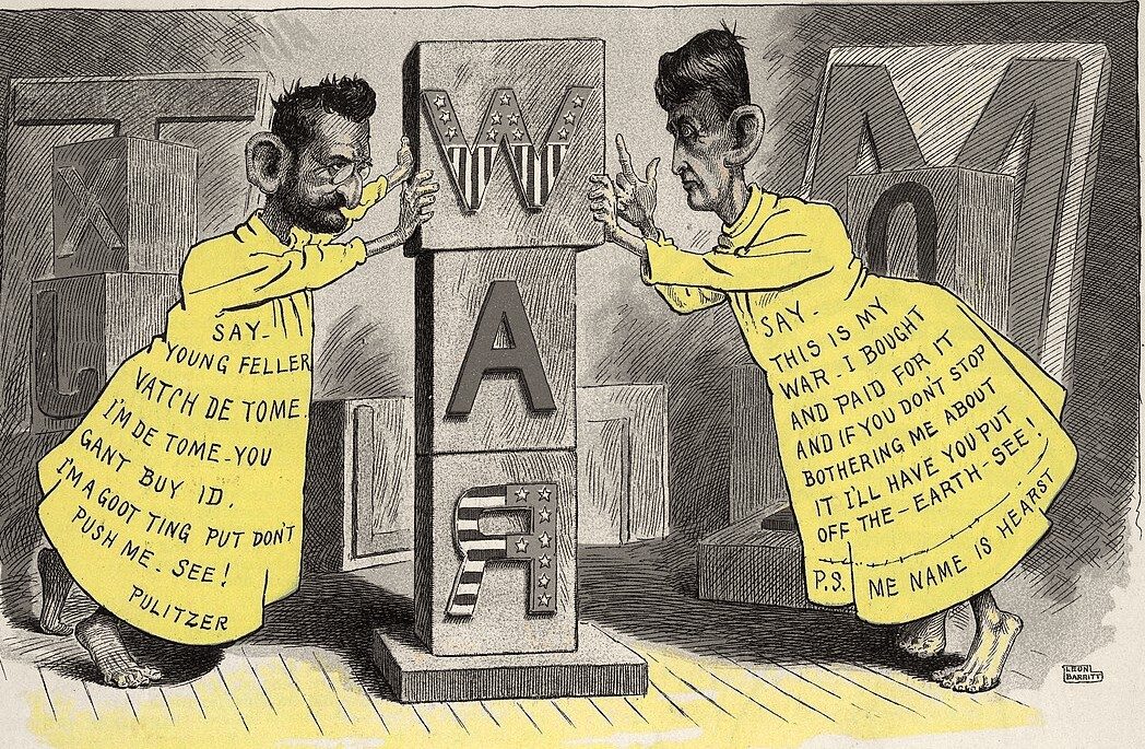 An 1898 cartoon showing Pulitzer and Hearst as the Yellow Kid pushing up a column of blocks spelling WAR.